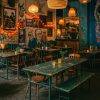 Super-Seat | Ein gemütliches Café mit Vintage-Tischen und unpassenden Stühlen | Groen metalen Armee klaptafels, houten vintage veldtafels, gemixte houten en metalen stoelen. | Horecameubilair